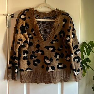 Leopard print distressed oversized sweater